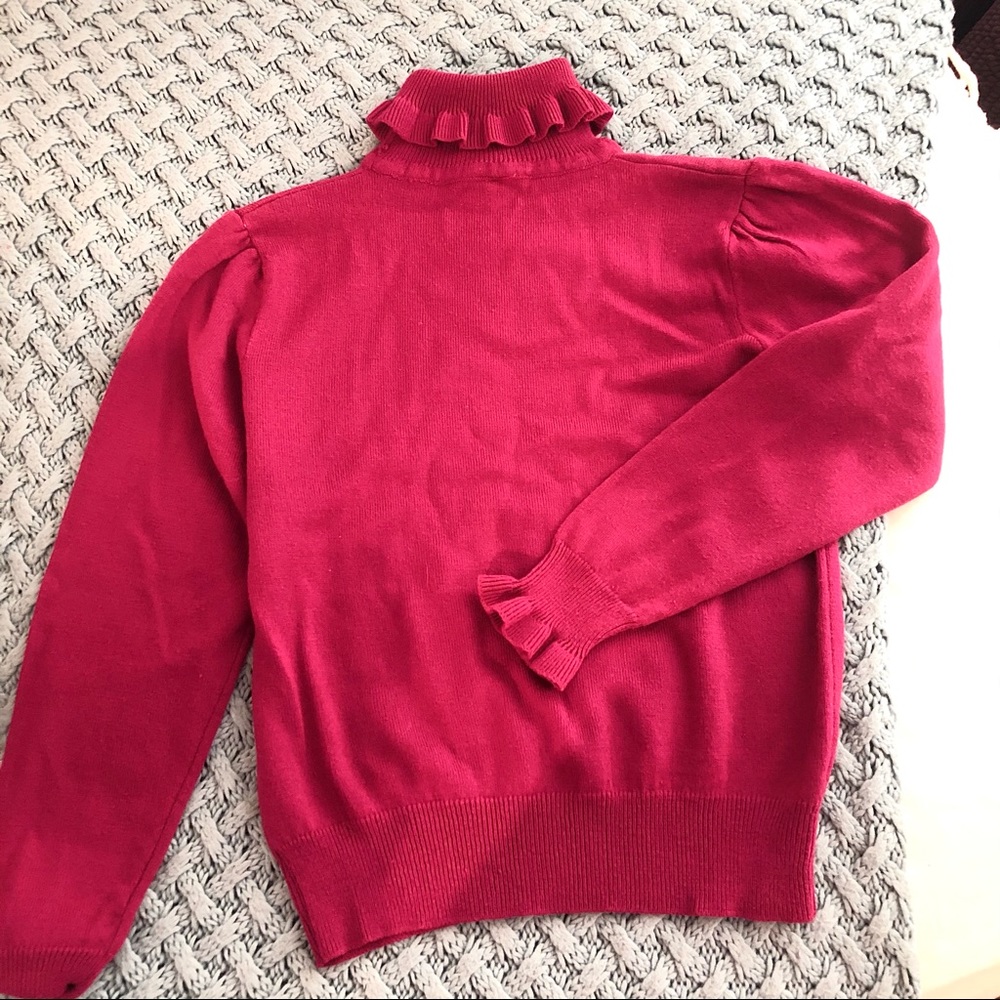 Pink ruffle neck turtleneck
